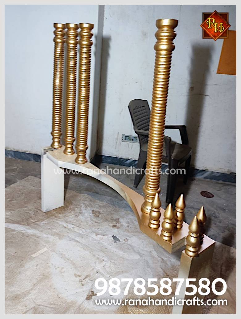 Vertical support pillars and structural elements of a Palki Sahib, showing the sturdy MS frame construction.