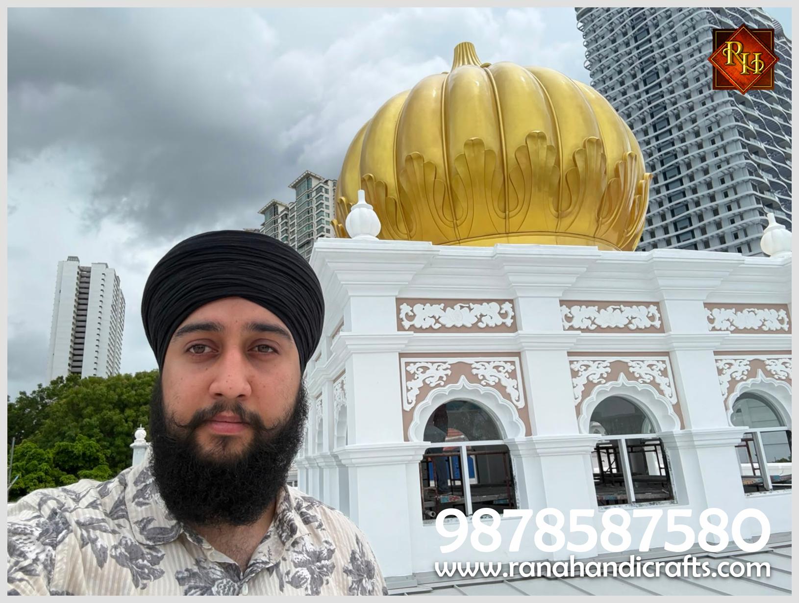 Uday Veer Singh Rana in a selfie taken on the rooftop of Wadda Gurdwara Sahib Penang, inspecting the installation of the golden dome he manufactured.