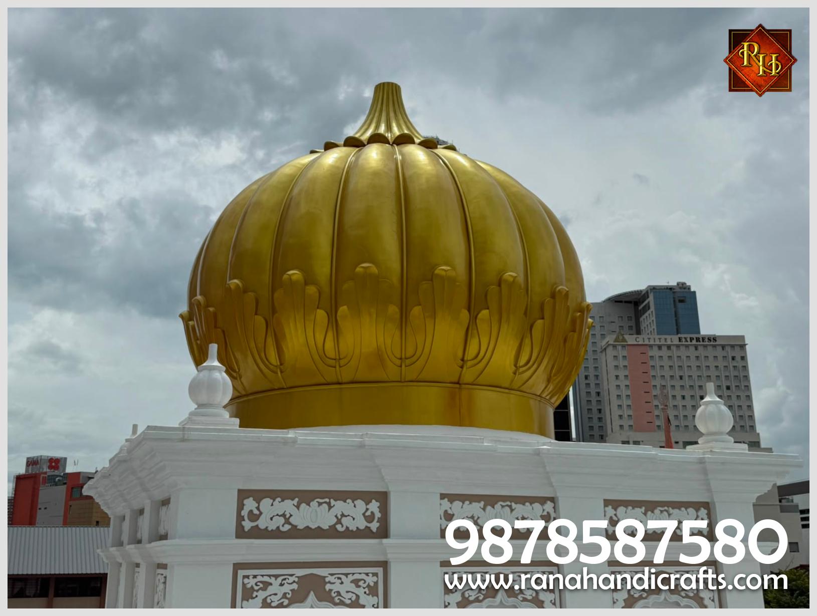 A detailed capture of the golden dome's structure and the decorative base, demonstrating the high-quality finish by Rana Handicrafts International at Wadda Gurdwara Sahib Penang.