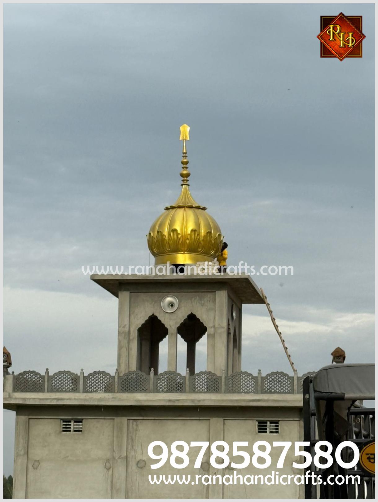 Distant view of the newly installed golden dome at Gurdwara Sahib Todarpur.