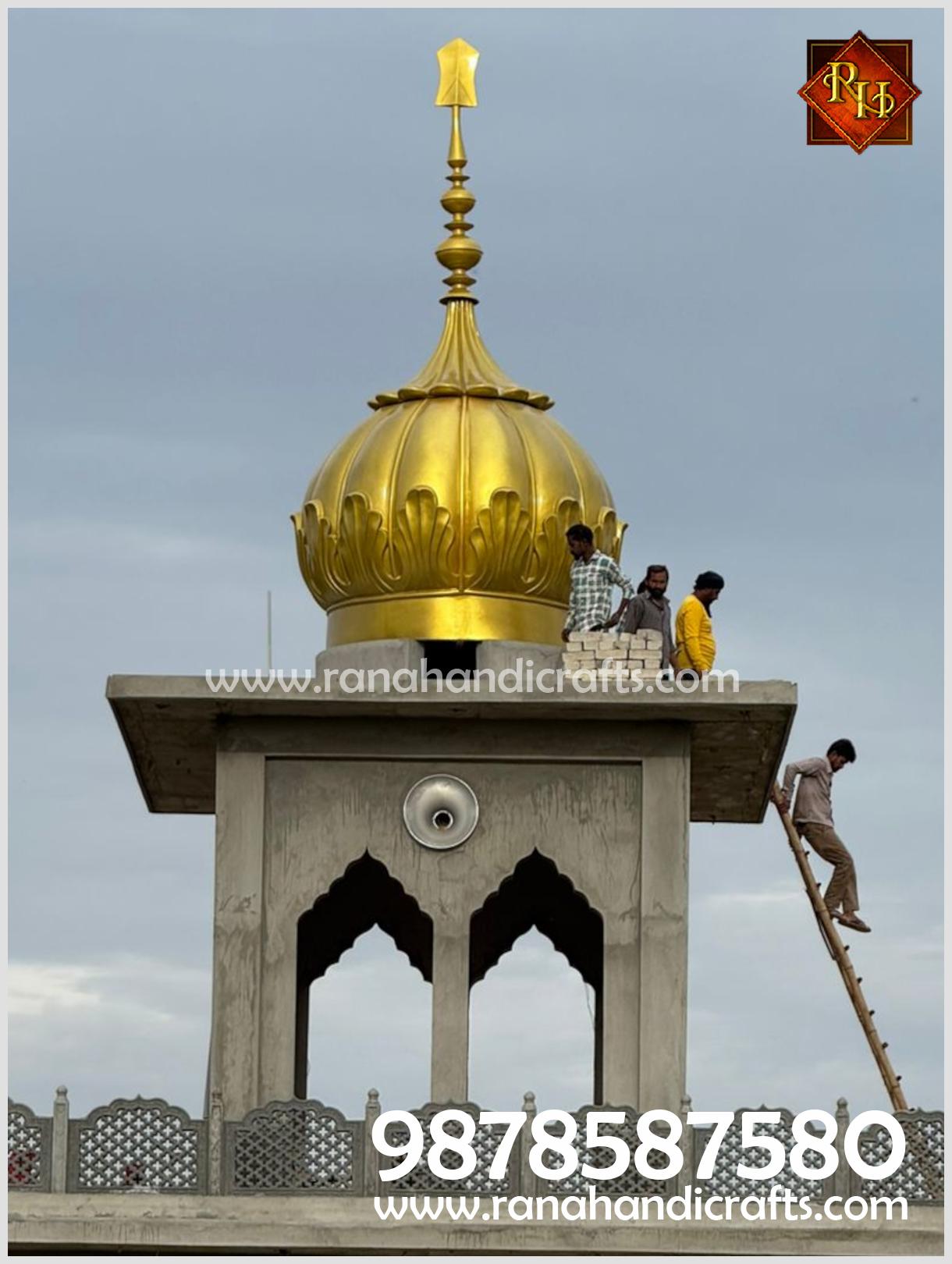 Rana Handicrafts expert team performing the final structural fitting of the 9ft diameter golden dome on the Gurdwara Sahib roof.