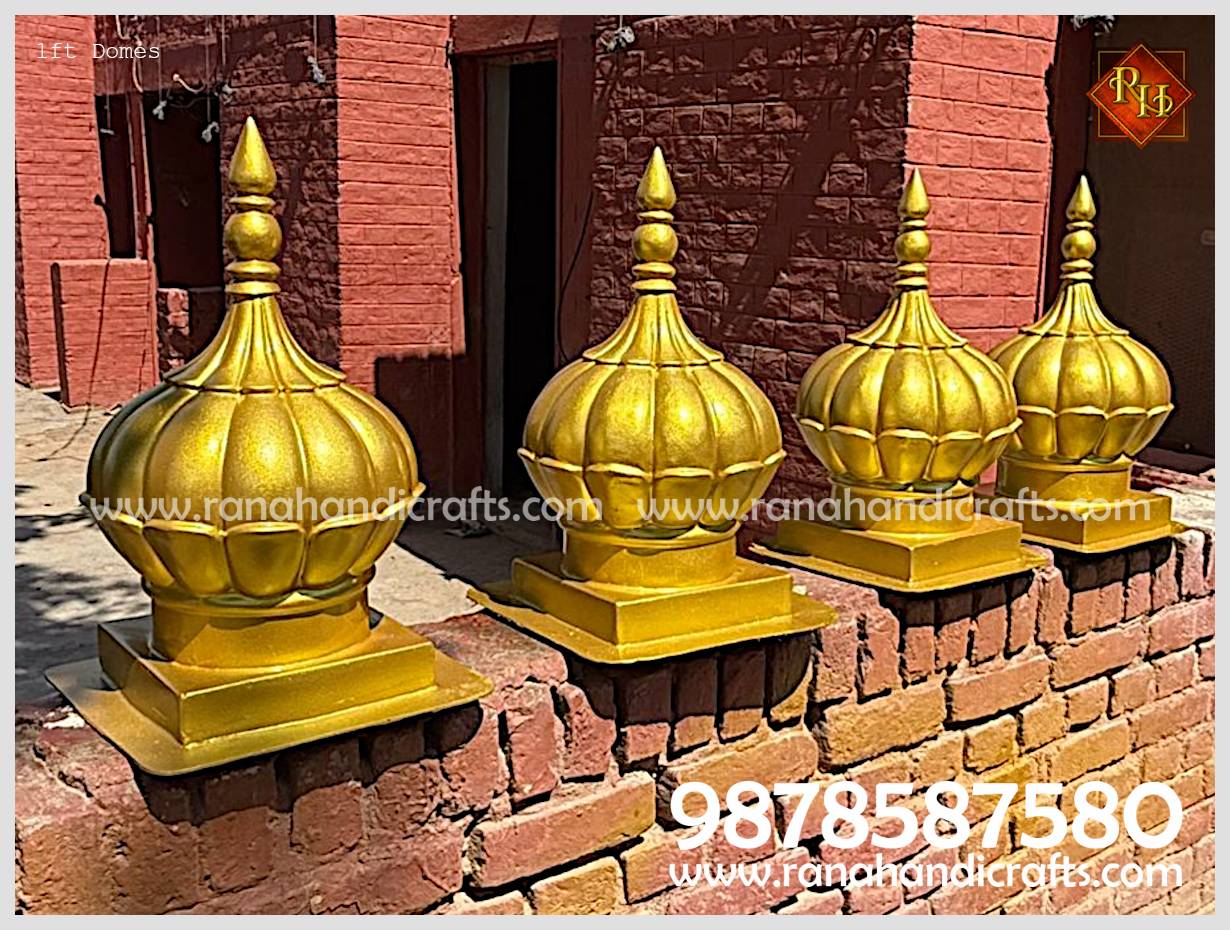 Four 1ft Diameter golden domes with decorative finials lined up on a brick wall, showcasing the brilliant metallic gold finish of the final product.