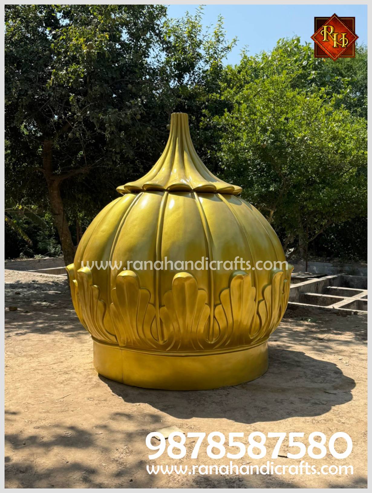 A medium outdoor shot focusing on the exquisite golden metallic finish of the finished Gurdwara dome. This durable structure includes an MS frame structure for international shipping.