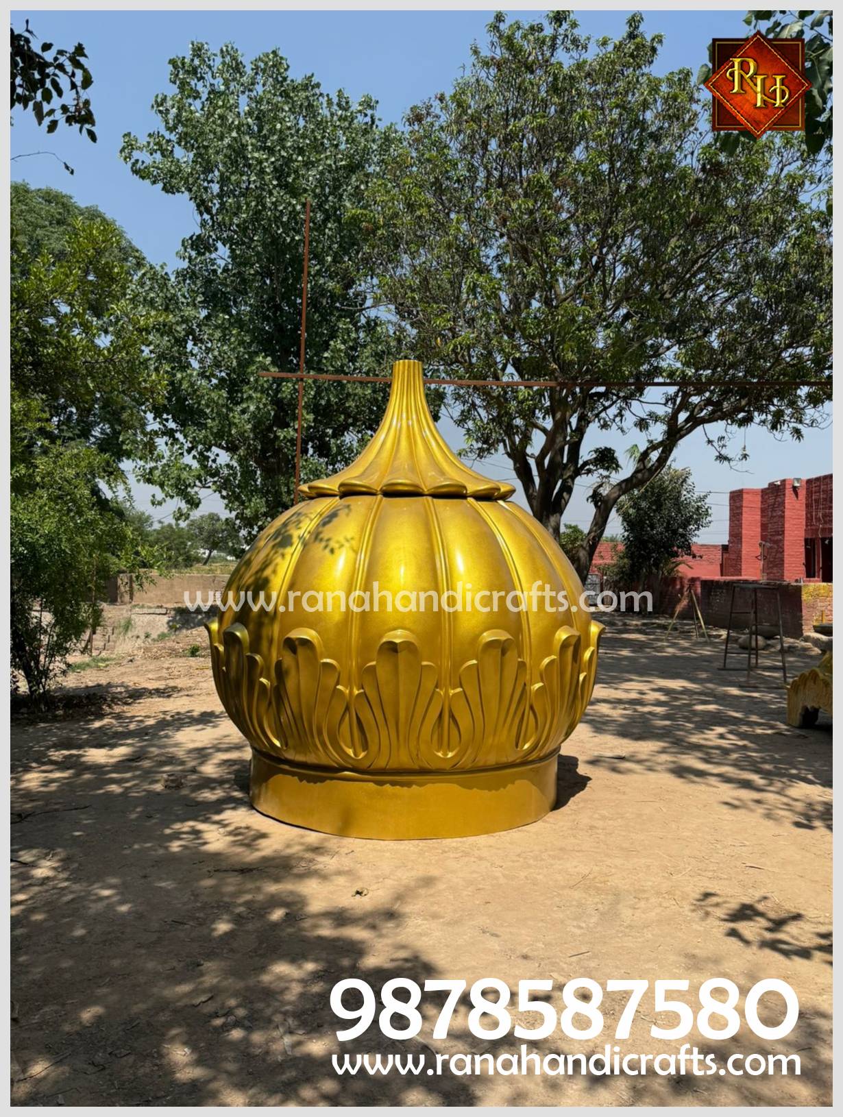 An outdoor perspective showcasing the massive scale of the completed golden Gumbad. The image features a clear view of the complex multi-layer design, ready for installation.