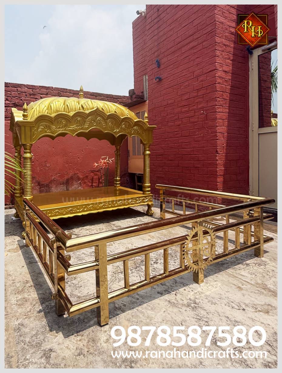 Detailed view of the golden stainless steel jangla railing designed for the Stichting Shri Guru Ravidass Sabha Nederland.