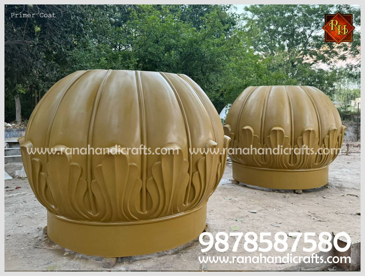 Workshop area showing two large dome sections in the primer phase, indicating the massive scale of the 9ft UK project.