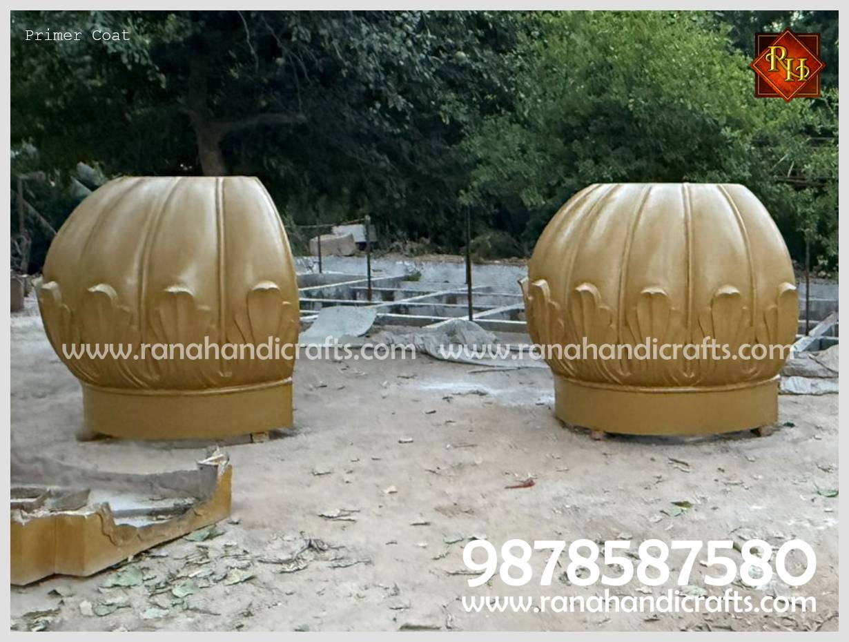 Two halves of the 9ft Gumbad in the primer coat stage, highlighting the intricate lotus petal base design. Part of the export project for Bristol, UK.