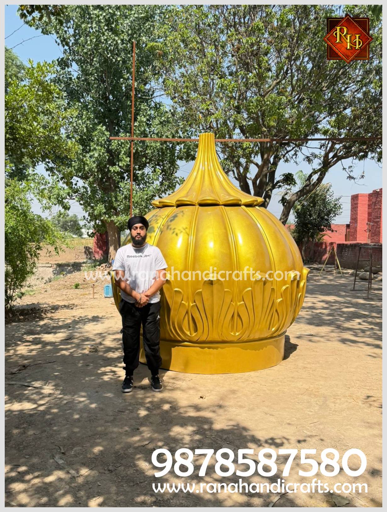Full scale view of Uday Veer Singh Rana beside the 9ft golden reinforced dome. Showcases the impressive height and metallic golden finish of the Gurdwara Gumbad.