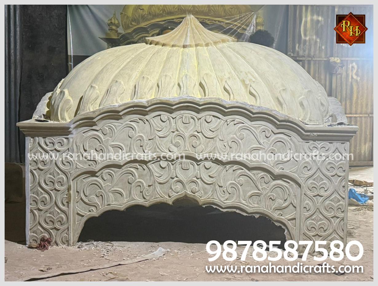 Close-up view of the carefully rubbed Palki Sahib dome showing detailed hand-carved floral patterns