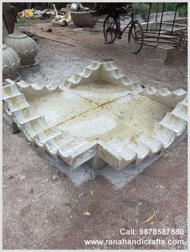 Intricate decorative base section for a 7ftx7ft Palki Sahib destined for Canada, showing the raw silicon fiber finish before painting, made by Rana Handicrafts International