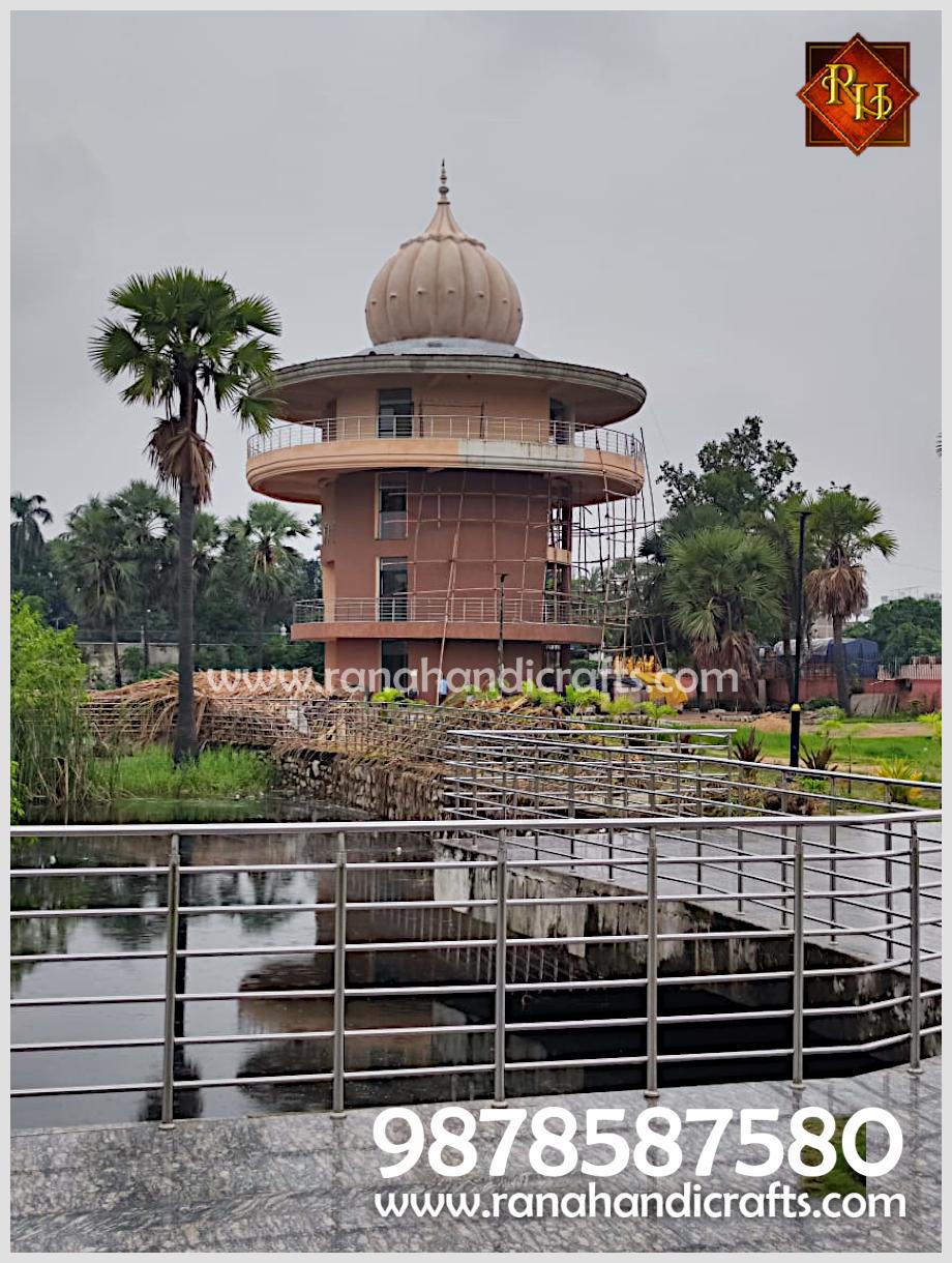 View of the Sikh Library building and its 14ft diameter dome from across a water body at Patna Sahib, Bihar, by Rana Handicrafts International.