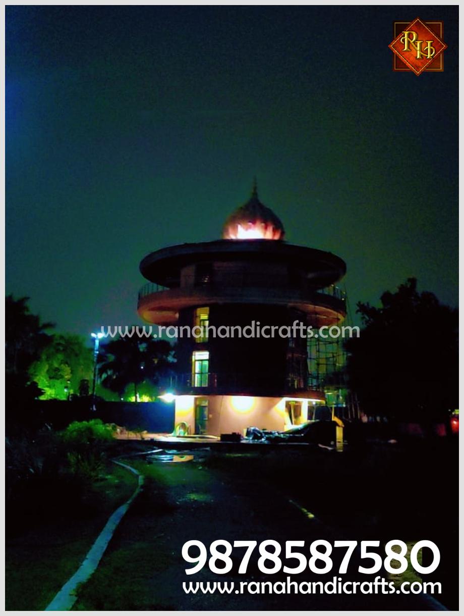 Illuminated view at night of the 14ft diameter dome on the Sikh Library in Patna Sahib, Bihar, manufactured and installed by Rana Handicrafts International.